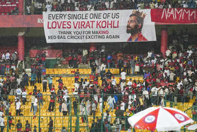 Bengaluru fans of royal challengers bengalurus virat kohli holds a large banne .jpg