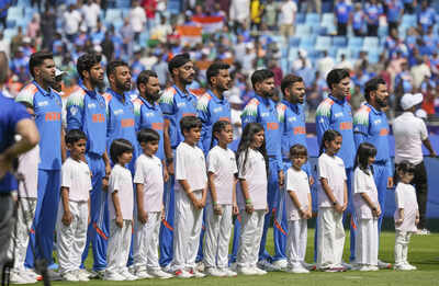 Dubai india players during the national anthem before the start of icc champion .jpg