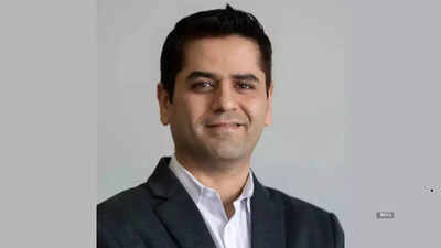 Tesla cfo vaibhav taneja receives 139 million compensation package know who he is educational qualif.jpeg