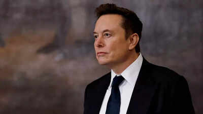 Elon musk returns to his tech empire as workers and investors demand answers.jpg