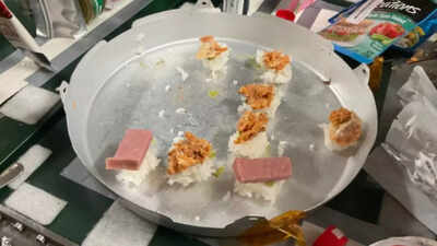 Nasa astronauts prepare space sushi aboard the iss in zero gravity during a heartwarming crew celebr.jpeg