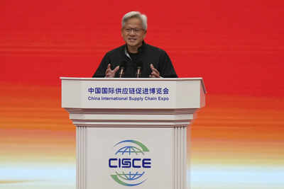 Ceo of nvidia jensen huang gestures as he speaks on stage during the opening ceremony of the thrd ch.jpeg