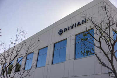 Rivian shares rose as much as 7 in extended trading before paring gains to trade up about 1 .jpg