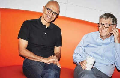 Satya nadella the ceo of microsoft with founder bill gates.jpg
