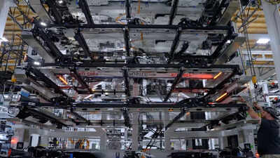 Spacex gives rare look inside starlink factory 70 satellites a week and mini lasers.jpg