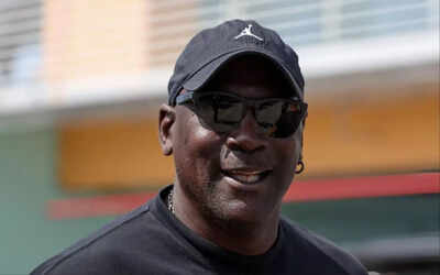 Michael jordan nba hall of famer and co owner of 23xi racing walks the grid prior to the nascar cup.jpeg