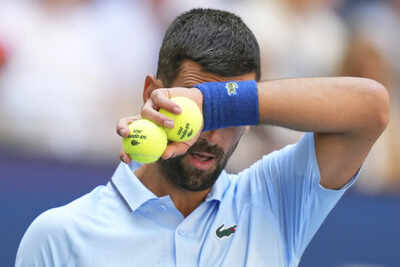 Novak djokovic is trying to solve riddles at the us open but is back in the 3rd round.jpg