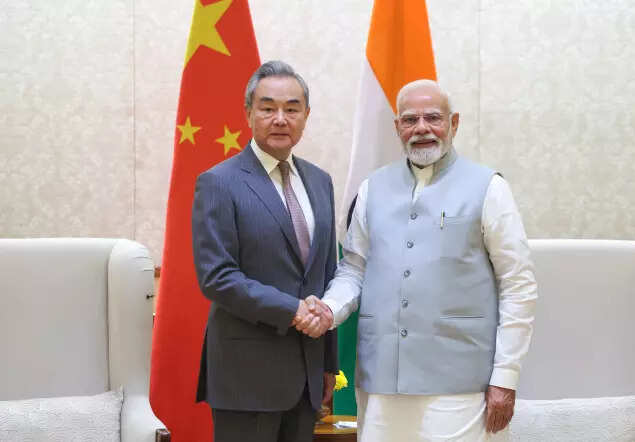 Pm modi met with chinese fm wang yi today.jpg