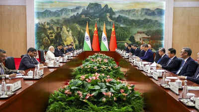 Prime minister narendra modi with chinese president xi jinping during a meeting in tianjin china.jpg