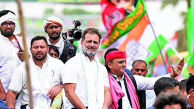Rjd neta tejashwi yadav congress mp rahul gandhi with sp chief akhilesh yadav during the voter adhik.png