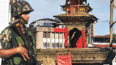 A nepalese soldier stands guard near the chariot of kumari on the last day of indra jatra festival c.jpeg