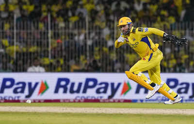 Chennai chennai super kings captain ms dhoni runs for the ball during an india.jpg