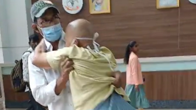 Coimbatore medical college hospital suspended two contract supervisors after a man was forced to car.png