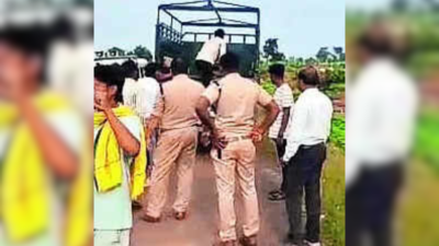 Cops and officials in bamori forest belt after a violent clash between bhil and bhilala commu nities.png