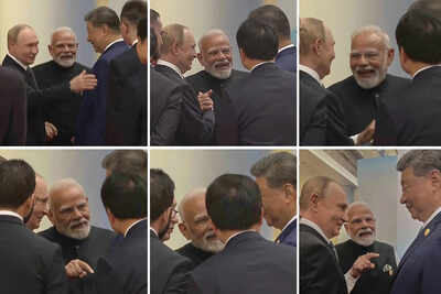 Photos show modi putin and xi in a huddle.jpg
