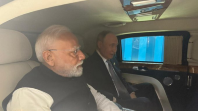 Pm modi shares a car ride with putin.jpg