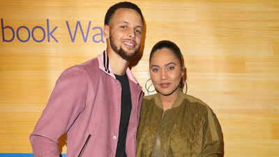 Stephen curry with ayesha curry.jpg