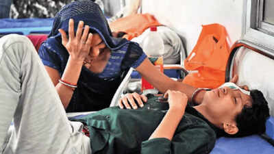 11 year old sinu verma with his mother babita verma at sewa sadan eye hospital in bhopal on friday.j.jpeg