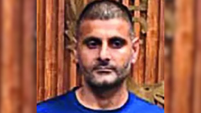 A gangster sunil sardhania who fled to the us on parole last year has returned to india after a harr.jpeg