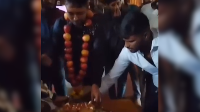 A viral video shows undertrial prisoner gubbachhi seena celebrating his birthday with cake and a lar.png