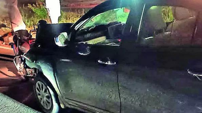 Drunk teacher drives car 750m with motorcycle in fender rider on hood.jpg