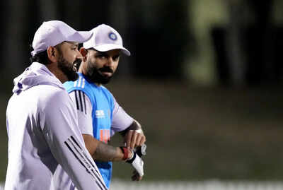Dubai indian players rohit sharma and virat kohli during a practice session ahe.jpg