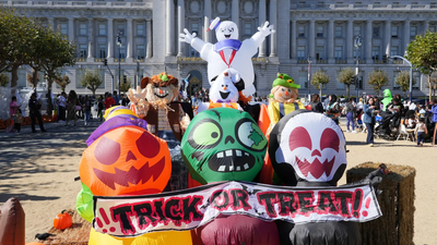 Halloween decorations are displayed in front of san francisco city hall at a pumpkin patch for disad.png