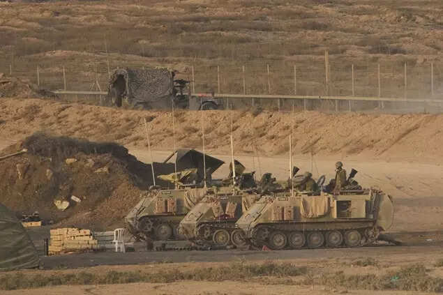 Israeli soldiers take position along the gaza strip border in southern israel sunday october 5 2025.jpeg