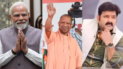 Pm modi left yogiadityanath pawan singh agencies.jpg