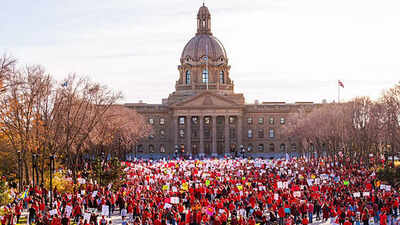 Red shirts and red rimmed eyes mark end of ata strike in alberta.jpg