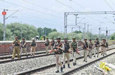 Srinagar jun 04 ani jammu and kashmir police personnel patrol on the railway.jpg