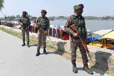 Srinagar sep 22 ani security forces stand guard after they find a suspicious.jpg