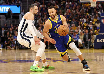 Stephen curry of golden state warriors and dillon brooks of memphis grizzlies.jpg