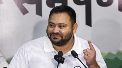 Tejashwi yadav promises government job for every household.jpg