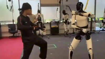 Tesla optimus learning kung fu elon musks humanoid robot stuns with human like moves and balance wat.jpeg