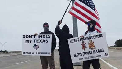 Three texas men waved two anti hindu placards from behind their masks and called it a protest.jpg