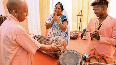 Chief minister yogi adityanath visits a stall during an event as part of 39janjatiya gaurav divas39.jpeg