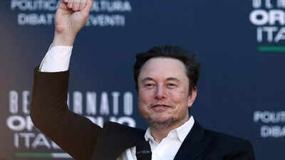 Elon musk39s high tech plan to end poverty robots do the jobs humans get the benefits.jpg