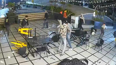 Masked assailants stormed a bhopal caf vandalizing furniture with swords and sticks in a swift viole.jpeg