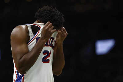 Philadelphia 76ers center joel embiid 21 wipes sweat from his face.jpg