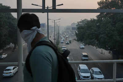 Photos show the daily struggle to breathe in new delhi39s dense winter smog.jpg