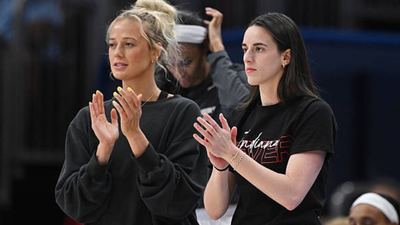 Sophie cunningham and caitlin clark via getty images.jpg