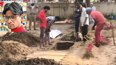 The body of irshad banjara being exhumed by vadodara police.jpg