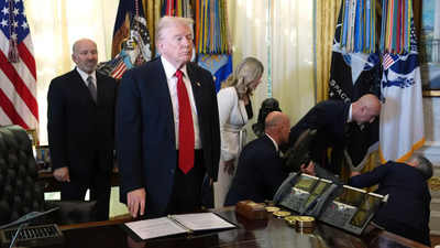 White house guest faints during a trump event.jpg