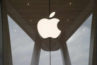 Apple logo is displayed at an apple store.jpg