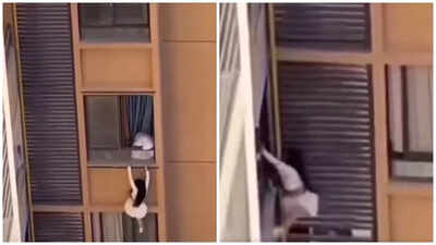 Mistress nearly plunges to her death from 10th floor window.jpg