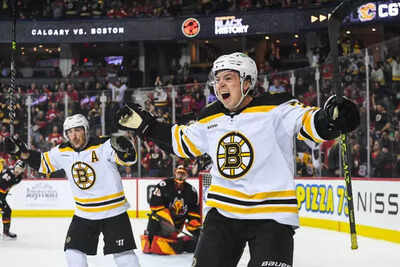 Nhl charlie mcavoy of the boston bruins celebrates after scoring the game winning goal against the c.jpeg