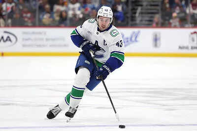 Nhl quinn hughes of the vancouver canucks plays the colorado avalanche.jpg