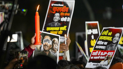 People take out candle march seeking justice for the unnao rape case in delhi pti photo.jpg