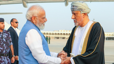 Pm modi lands in oman x.jpg